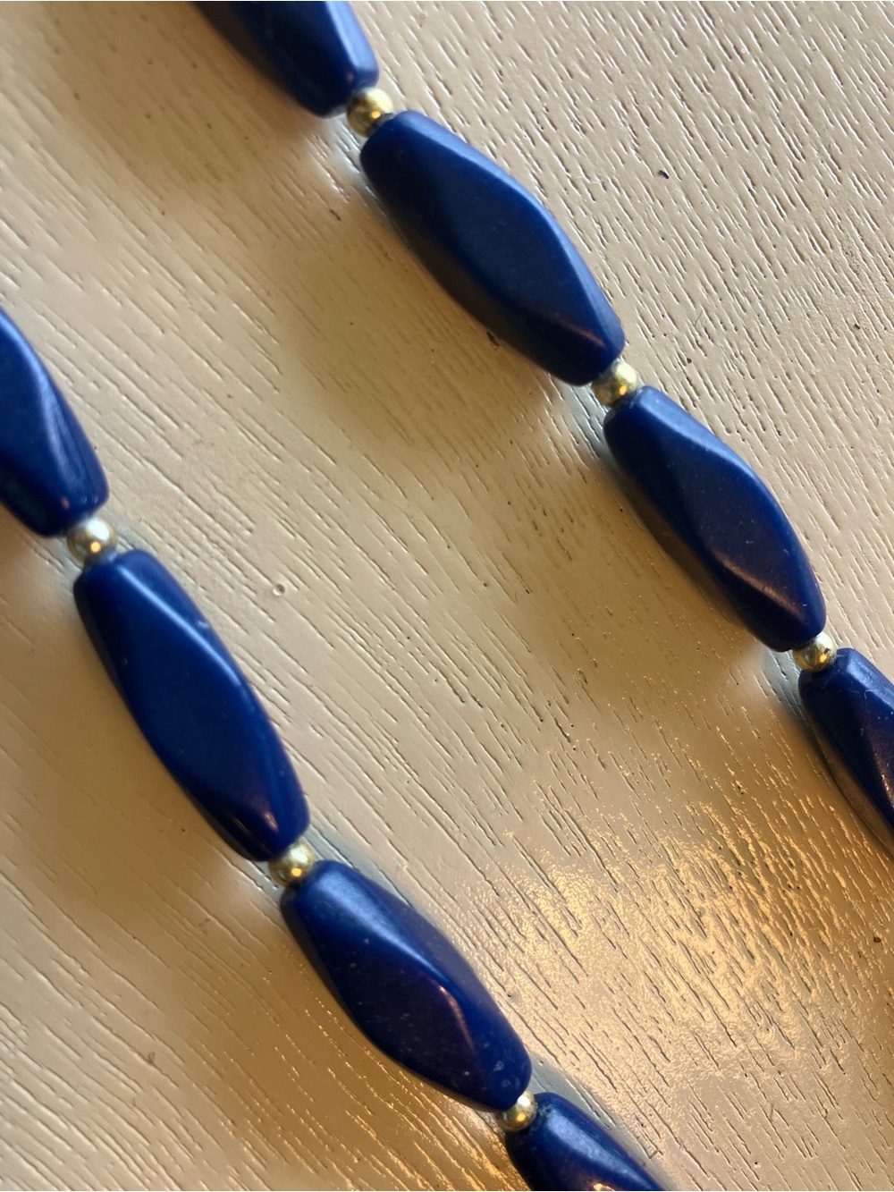 Mod retro dark blue vintage lucite necklace with gold spacer beads